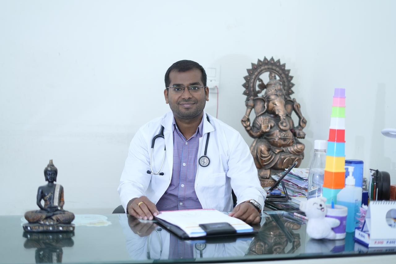 Pediatrician greeting a child in clinic